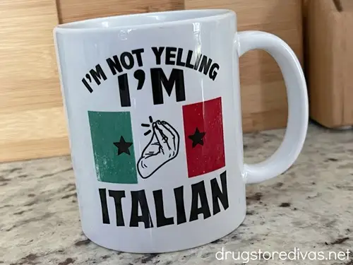 A white mug that says I'm Not Yelling I'm Italian on it.