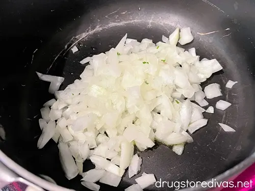 Chopped onion in a sauce pan.