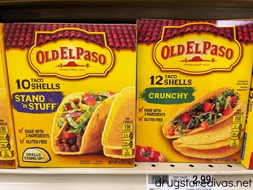 Two boxes of Old El Paso taco shells on a shelf.