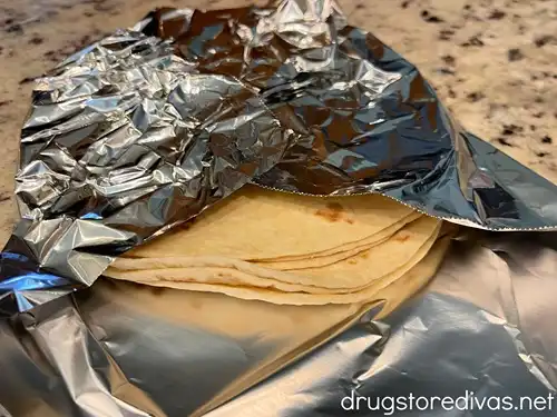 Tortillas wrapped in foil.