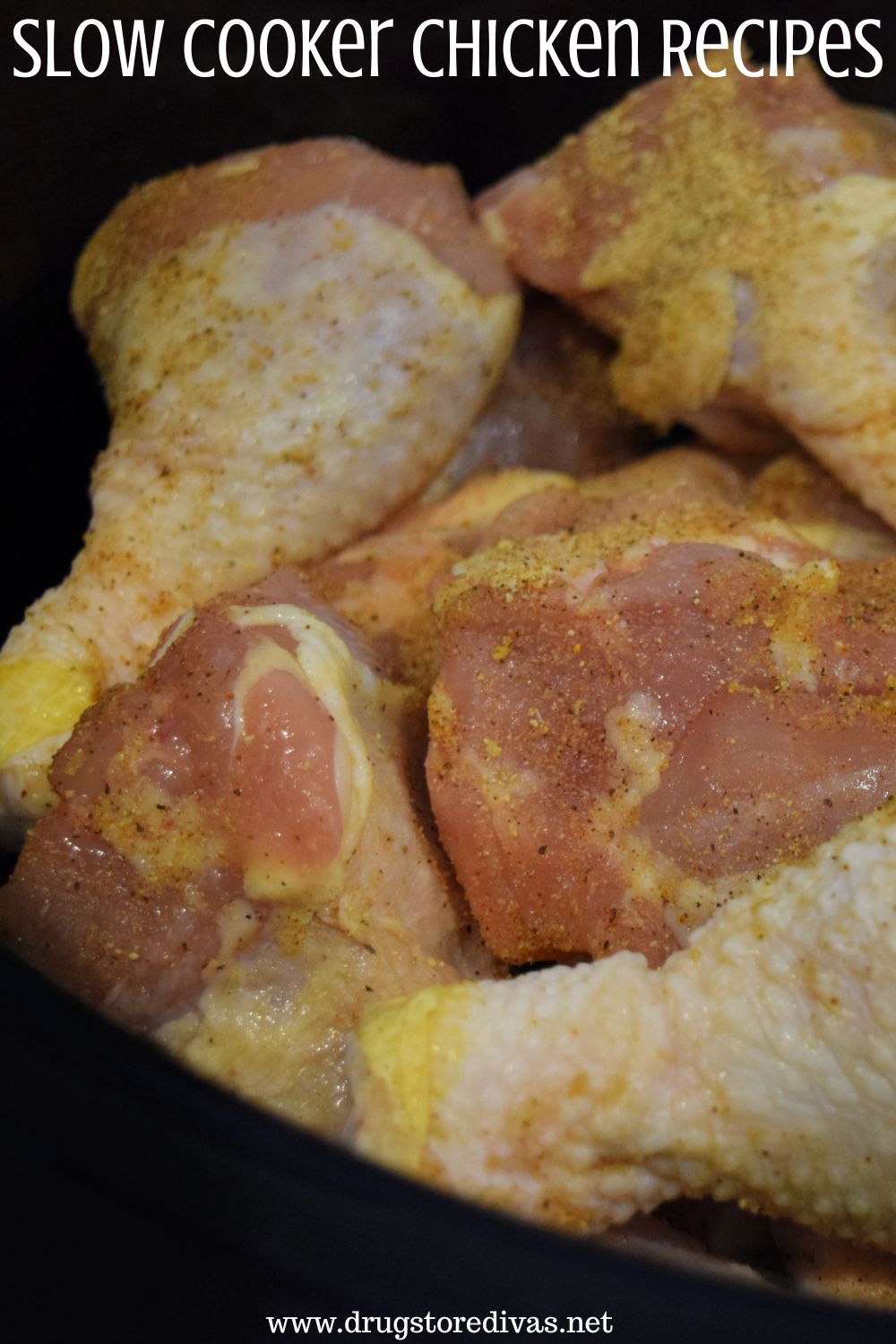 Raw, seasoned chicken drumsticks in a slow cooker with the words 