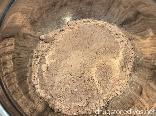 Brownie mix in a silver bowl.