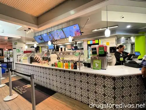 The register area inside an Alpaca Chicken restaurant in Wilmington, NC.