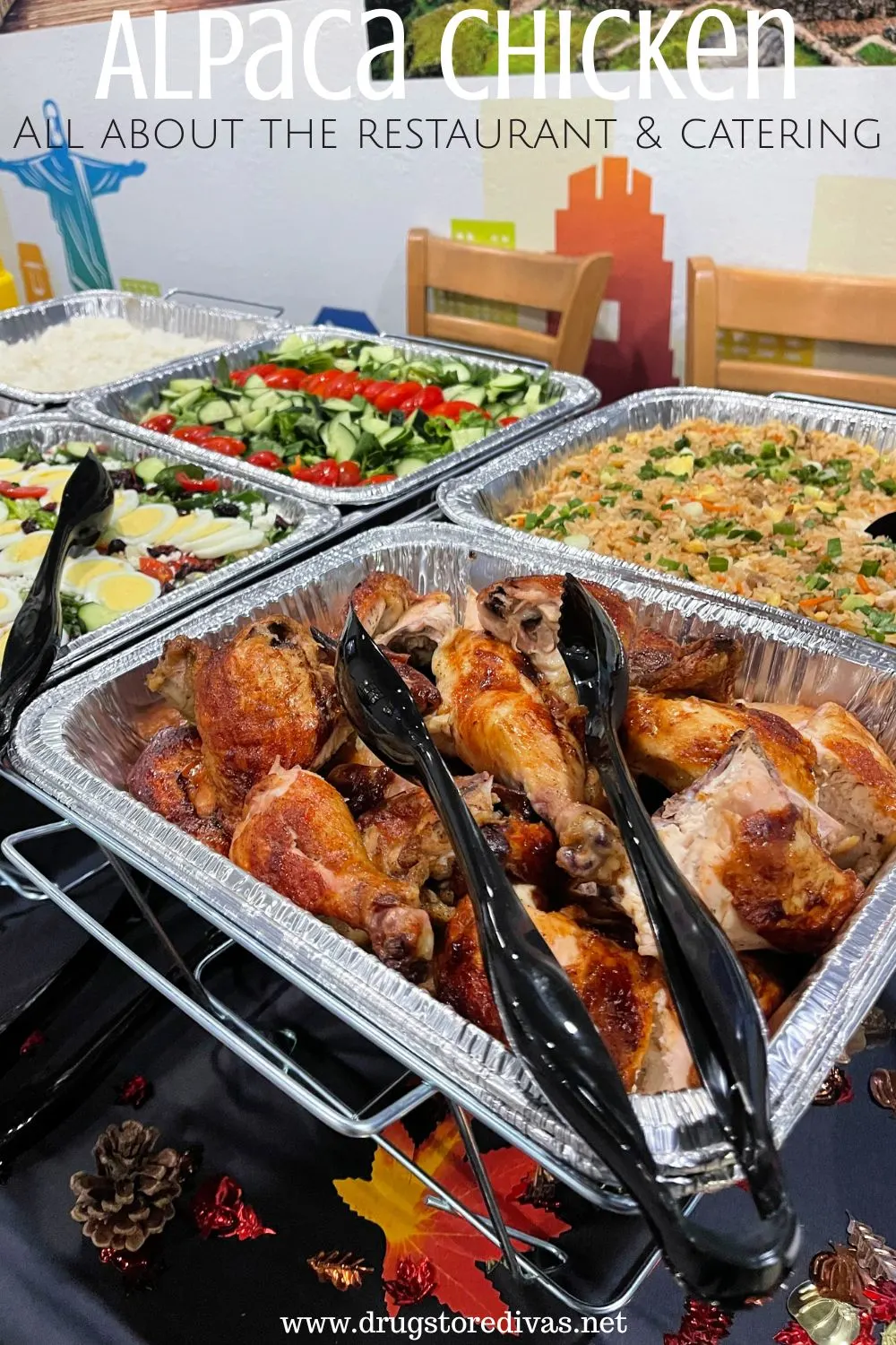 Catering trays of chicken, fried rice, and salads on a table with the words 