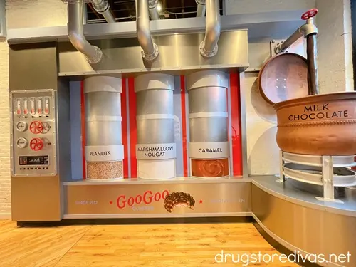 Displays of a copper candy kettle and filling stations inside Goo Goo Chocolate in Nashville.