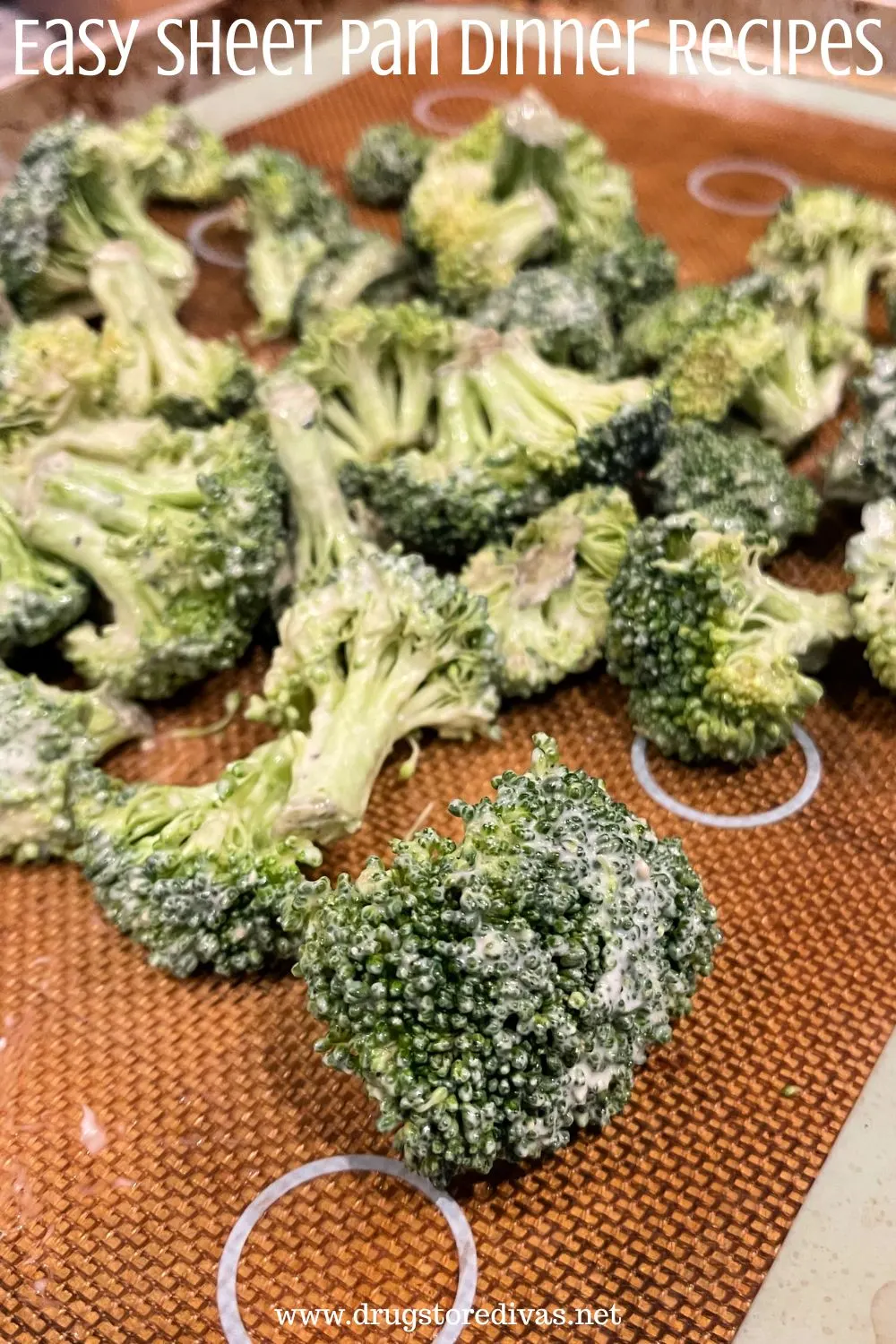 Broccoli on a sheet pan with the words 