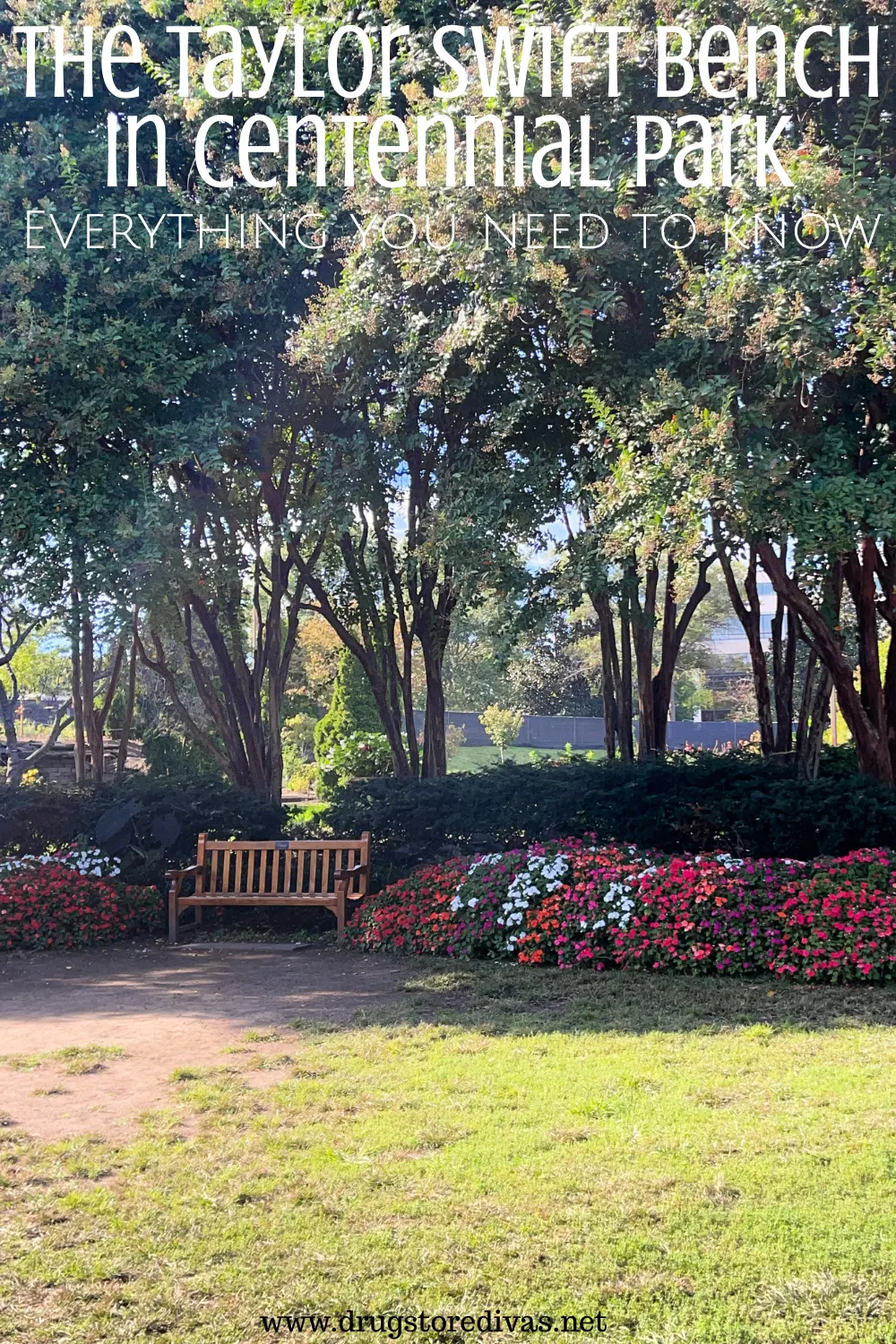 A bench under trees surrounded by flowers in a garden with the words 