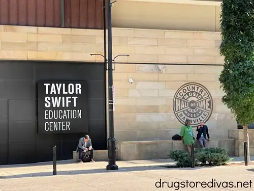 The outside of the Country Music Hall of Fame with an advertisement for the Taylor Swift Education Center.