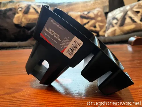 A car cup organizer on a table.