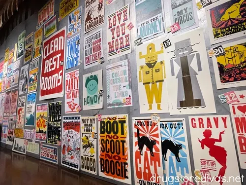 Posters hanging on a wall at Hatch Show Print in Nashville.