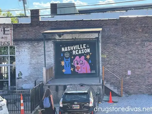 A mural at Marathon Village in Nashville that says "Nashville Is The Reason".