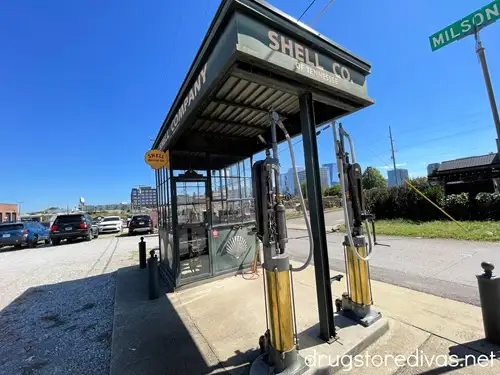 A restored self-pump Shell gas station in the parking lot of Marathon Village in Nashville.