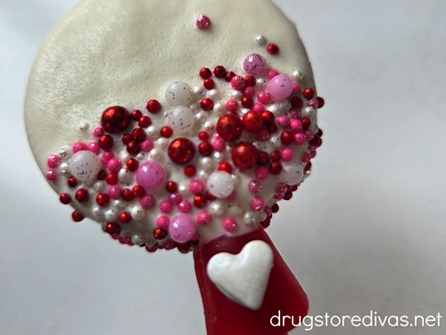 An Oreo cookie decorated to look like a gumball machine.