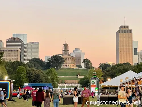The Tennessee State Capitol building in the background with Nashville Oktoberfest in the foreground at sunset.