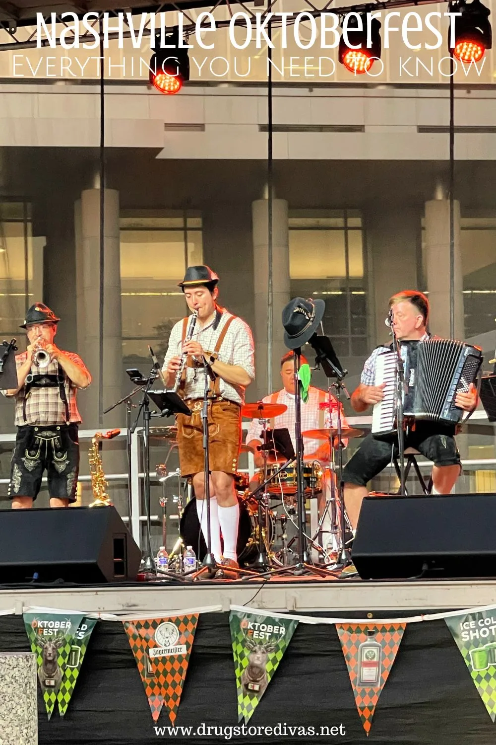 A German band on stage at an Oktoberfest festival with the words 