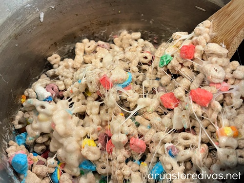 Lucky Charms covered in melted marshmallow in a stockpot.