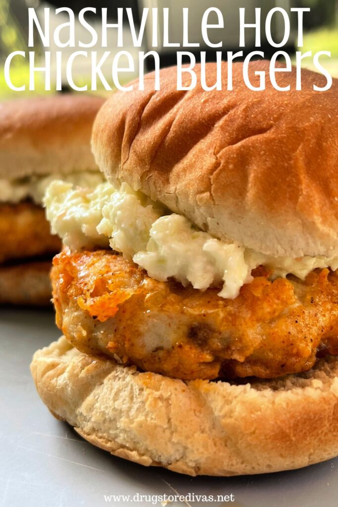 Two chicken burgers with coleslaw on buns with the words "Nashville Hot Chicken Burgers" digitally written on top.