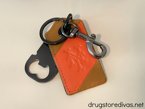 A keychain bottle opener combo with a New York Mets logo on it.