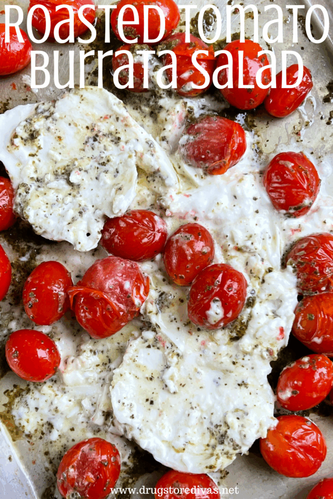 Cherry tomatoes and white cheese on a tray with seasoning on it and the words "Roasted Tomato Burrata Salad" digitally written on top.