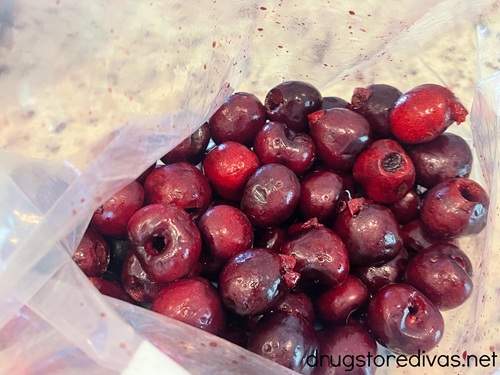 Pitted cherries in a plastic bag.