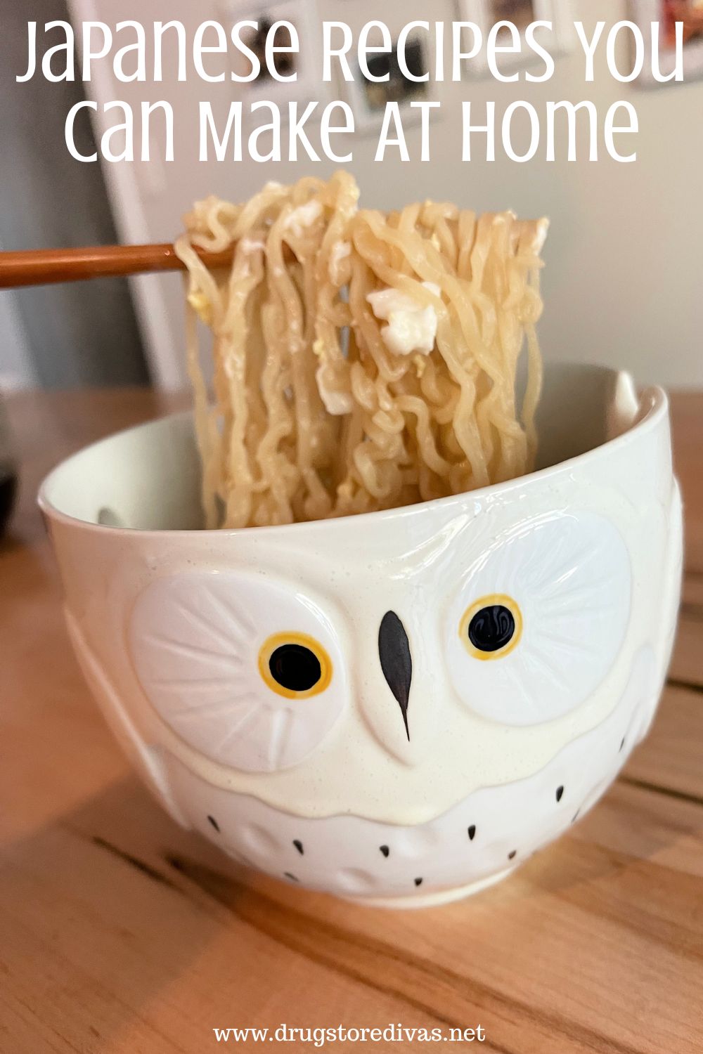 An owl-shaped bowl filled with ramen with chopsticks pulling the ramen out and the words 