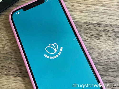 A phone open to the Too Good To Go mobile app.