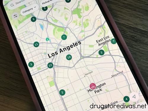 A phone open to a map of Los Angeles in the Too Good To Go mobile app.