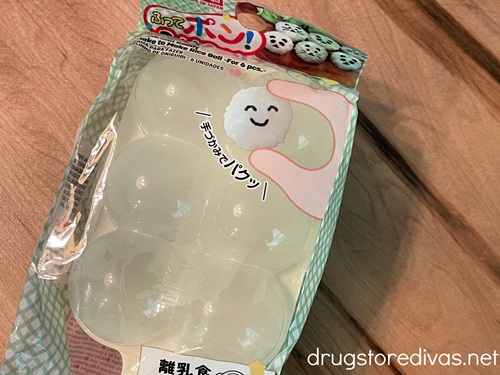 A rice ball maker from Daiso in its package.