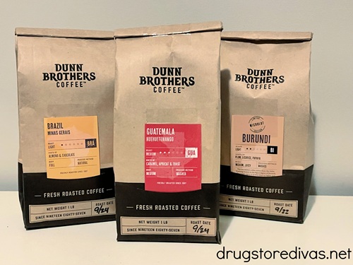 Three bags of Dunn Brothers Coffee sitting on a white table.