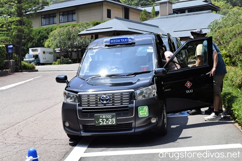 A row of taxi cabs in Japan.