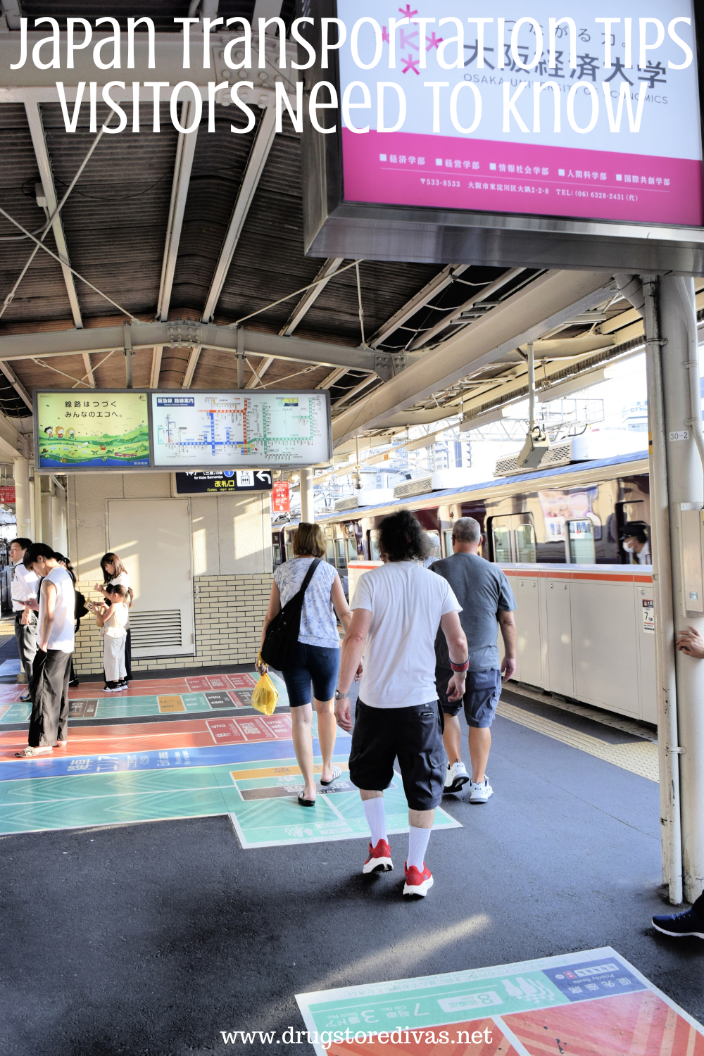 People walking on a train platform with a train next to them and signs above them with the words 