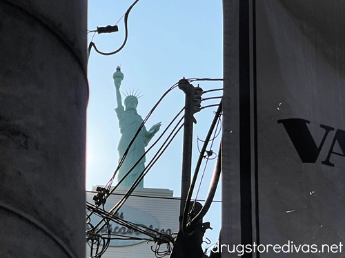 A replica of the Statue of Liberty on top of a building in Amerikamura, Japan.